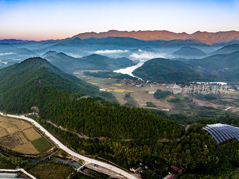 Aerial photography of rural rice fields and mountains